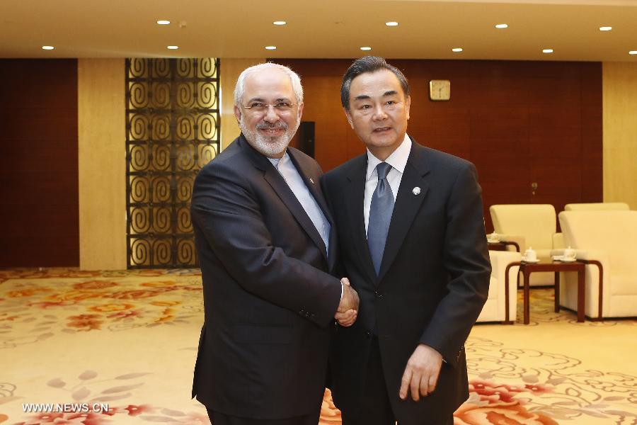 Le ministre chinois des A.E. rencontre son homologue iranien