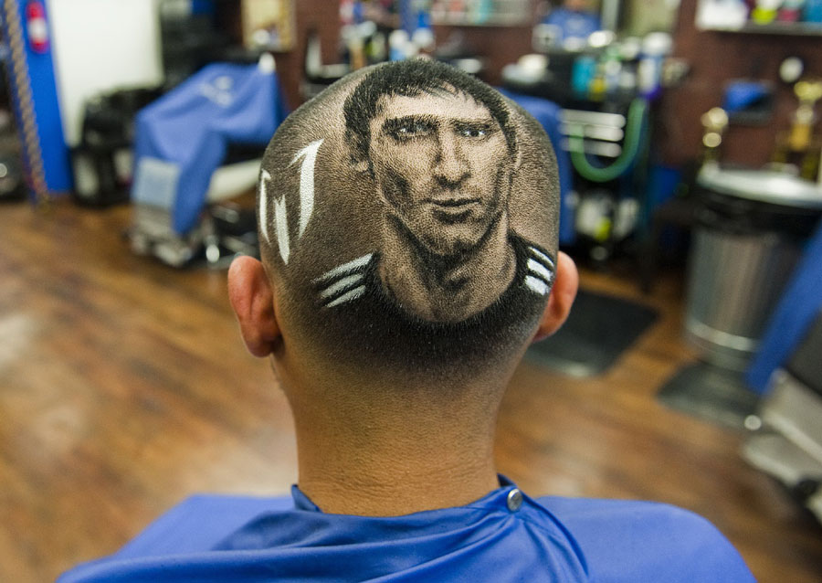 L'image de Lionel Messi reproduite sur son crâne est la plus grande fierté de ce supporter de l'Argentin, lundi 30 juin 2014.