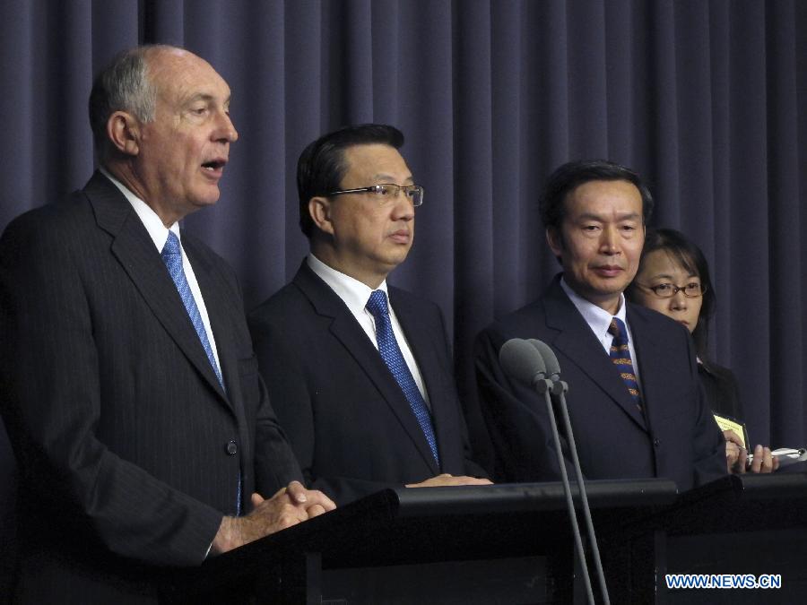 Vol MH370 : des ministres d'Australie, de Chine et de Malaisie "modérément optimistes" que l'appareil sera retrouvé
