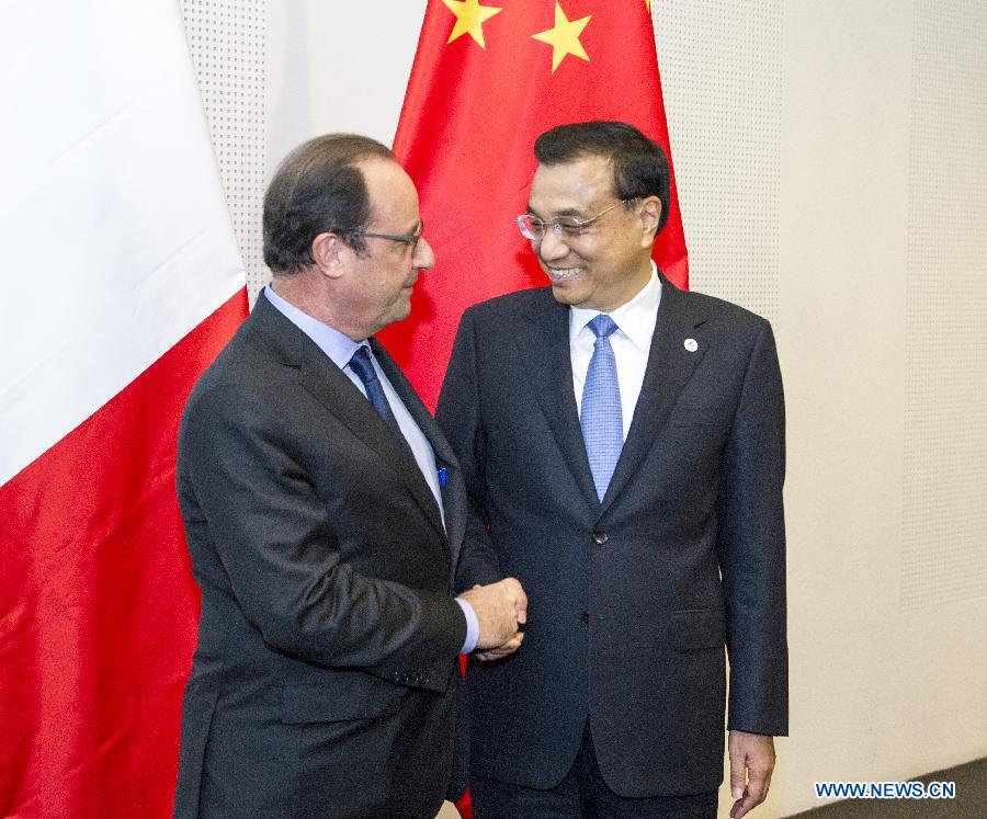 Le Premier ministre chinois et le président français s'entretiennent de l'approfondissement des relations bilatérales