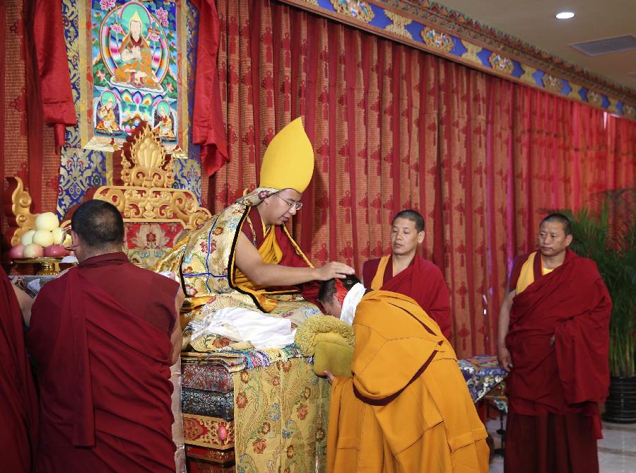 Le panchen-lama rencontre des érudits du bouddhisme tibétain à Beijing