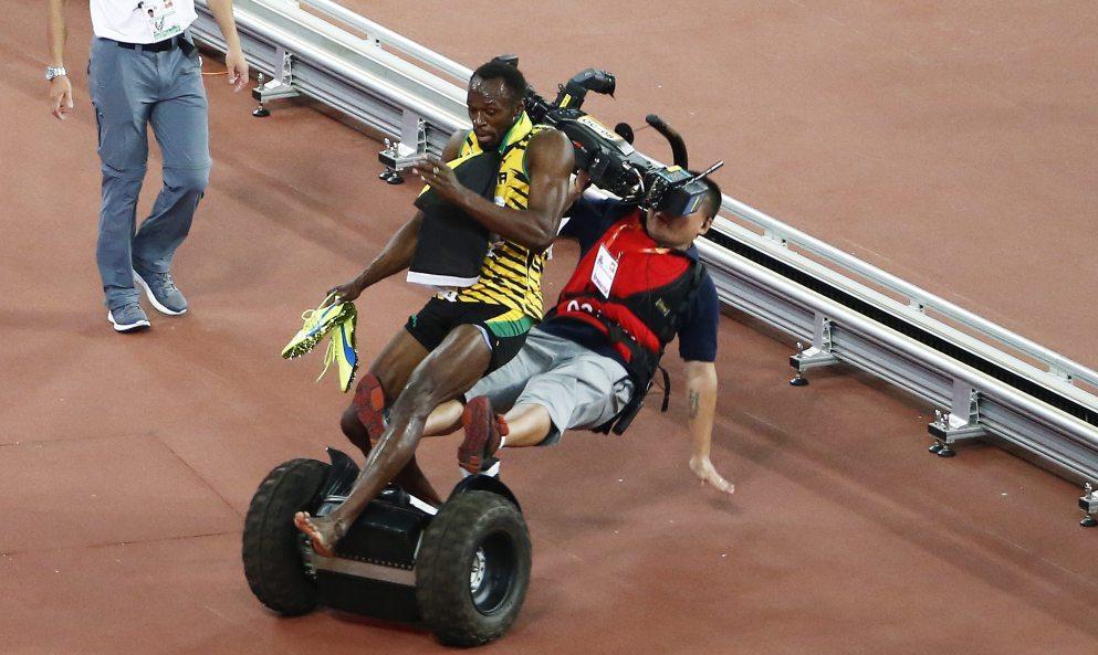 Le cameraman chinois qui a renversé Usain Bolt s’excuse en lui faisant un cadeau