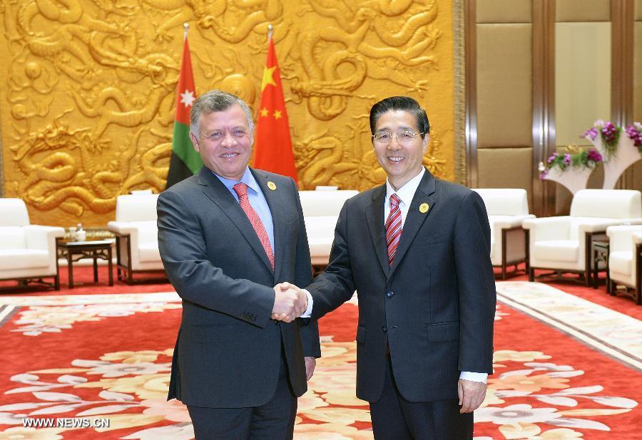 Chine : un conseiller d'Etat rencontre des hôtes étrangers