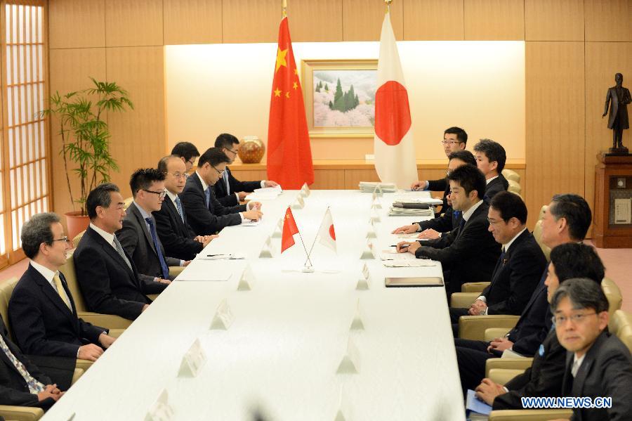 La Chine et le Japon veulent rendre les différends contrôlables, selon le ministre chinois des A.E.