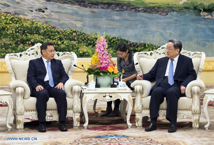 Yu Zhengsheng rencontre une délégation laotienne