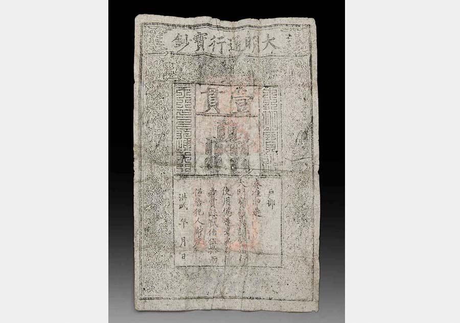 Un billet de banque caché dans une ancienne sculpture chinoise