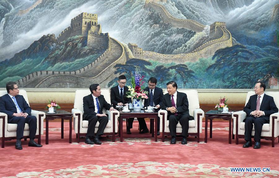 Liu Yunshan rencontre une délégation du journal du Parti communiste vietnamien