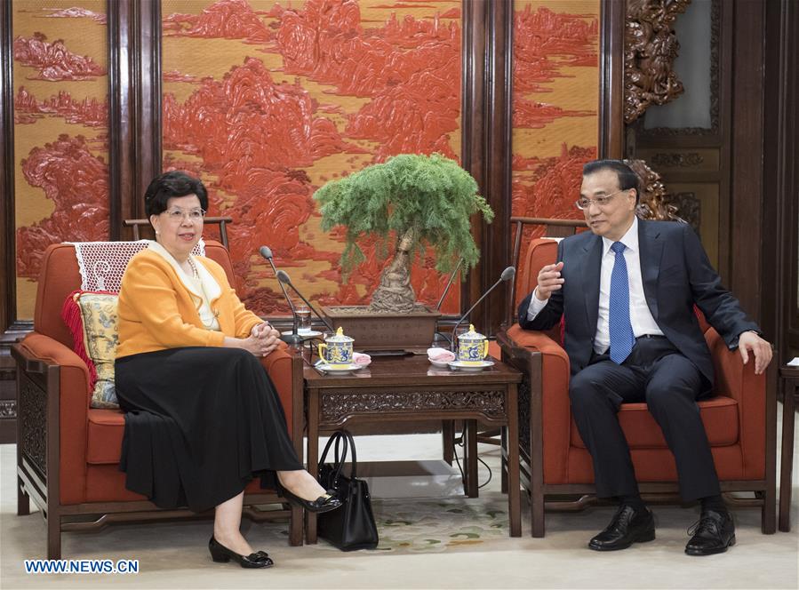 Le PM chinois rencontre l'ancienne directrice de l'OMS
