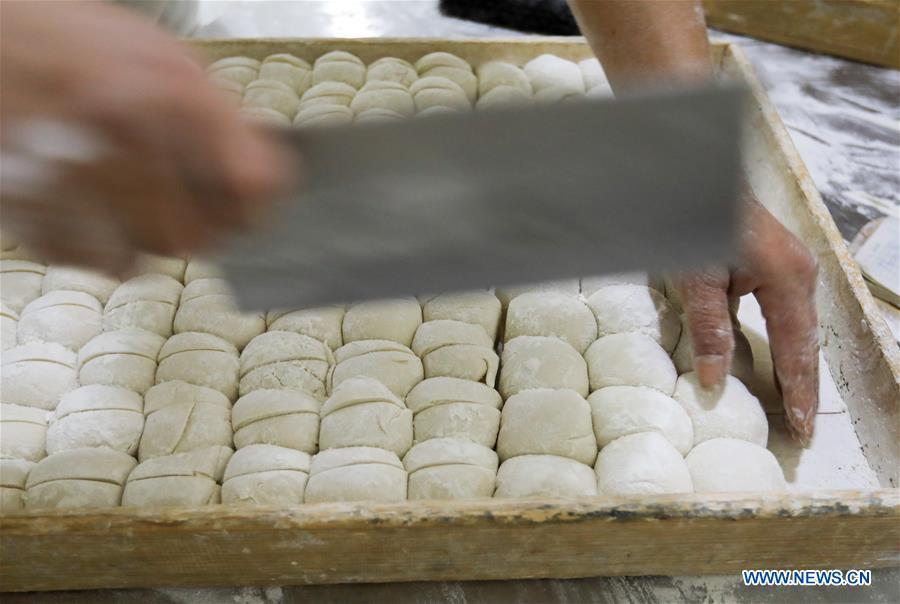 Les fameux petits pains Baoning cuits à la vapeur