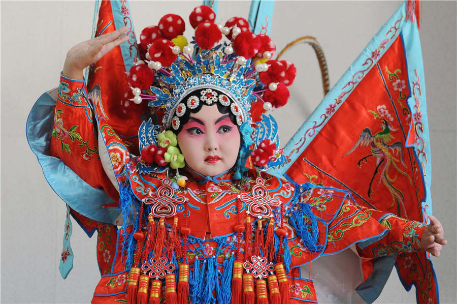 De jeunes Chinois passionnés par l'Opéra de Pékin