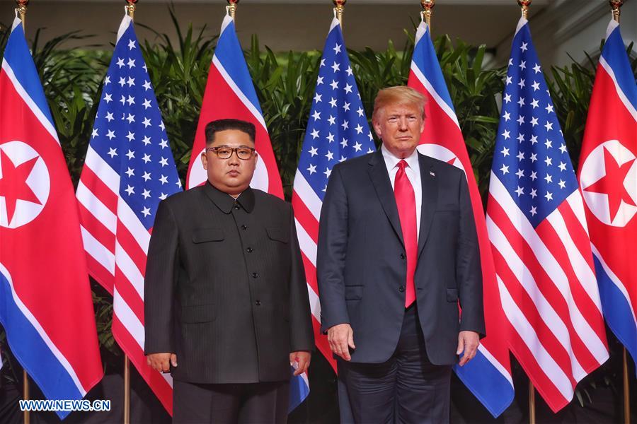 Poignée de main Kim-Trump avant le sommet historique