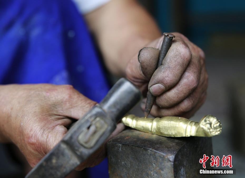 Dans le Hunan, les mille coups de marteau d'un chaudronnier
