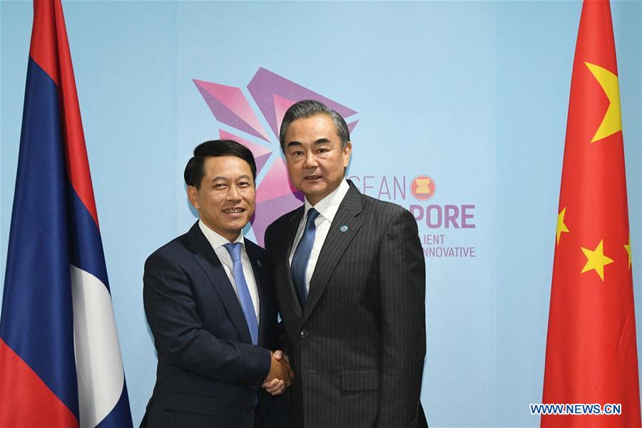 Le conseiller d'Etat chinois et le ministre laotien des A.E. se rencontrent pour renforcer les relations bilatérales