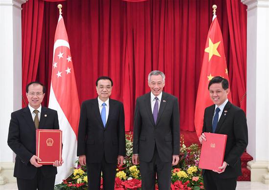 La Chine et Singapour signent un nouveau document de coopération pour améliorer leur accord de libre-échange