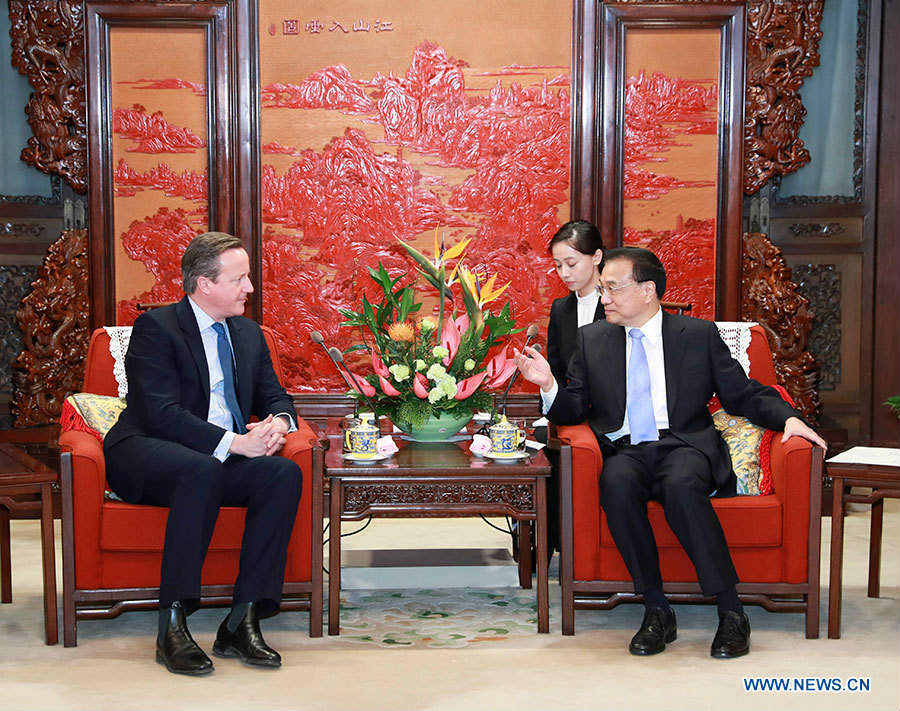 Le PM chinois rencontre un ancien PM britannique
