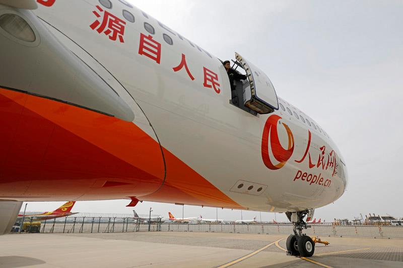 Premier vol réussi pour l'avion « Le Quoditien du peuple en ligne » entre Shanghai et Beijing