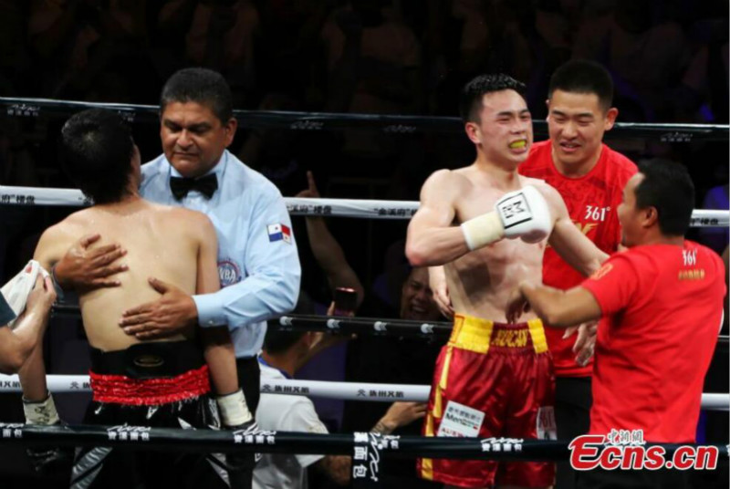 Le boxeur Xu Can défend avec succès son titre mondial des poids plume WBA