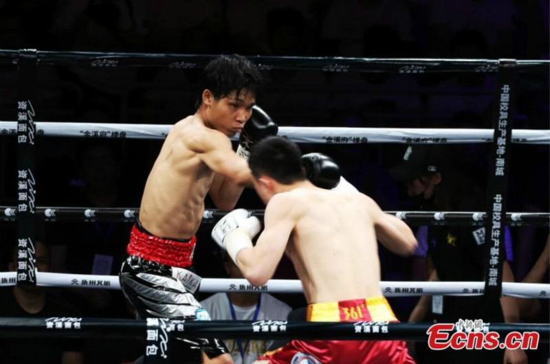 Le boxeur Xu Can défend avec succès son titre mondial des poids plume WBA