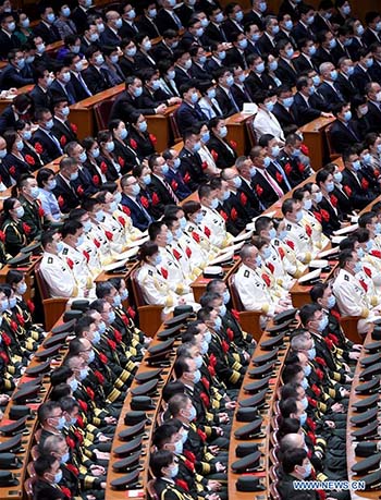 La Chine organise une réunion pour saluer les modèles dans la lutte contre le COVID-19