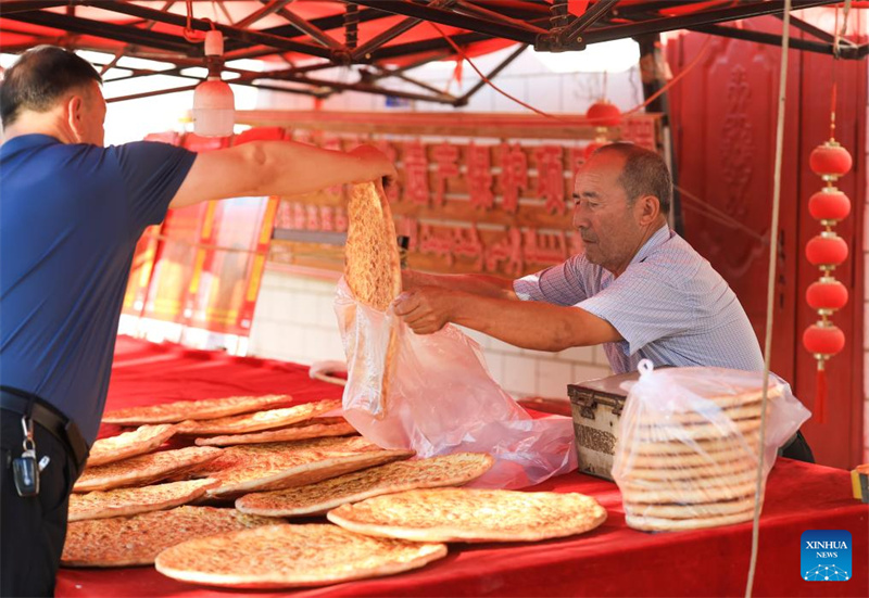 Xinjiang : les techniques traditionnelles de fabrication du naan transmises et développées à Kuqa